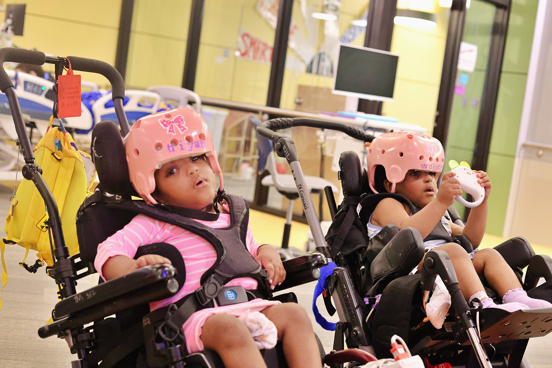 Conjoined twins enjoying therapy at Ranken Jordan